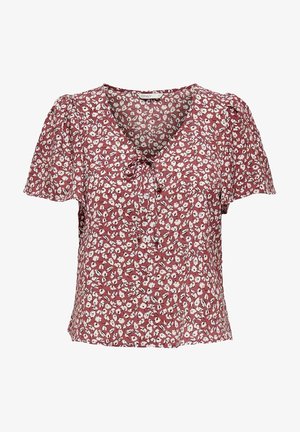 Rode blouse met korte mouwen, wit bloemenpatroon, V-hals en klein strikdetail aan de voorkant.