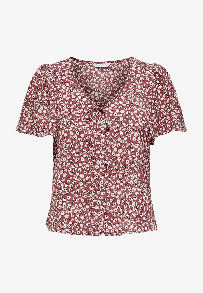 Blouse rouge à manches courtes avec motif floral blanc, encolure en V et petit détail de nœud à l'avant.