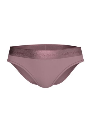 Culotte de bikini mauve pour femme Calvin Klein avec une large ceinture brillante comportant des logos "Calvin Klein" répétés.
