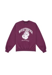 Felpa viola con le scritte "WRSTBHVR" e "Sweet but Savage" in bianco. Collo e polsini a coste, materiale in cotone morbido. Vestibilità classica.