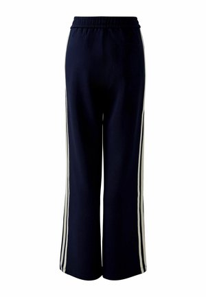 Marineblaue weit geschnittene Hose mit elastischem Bund, ausgestattet mit weißen seitlichen Streifen und einer einzelnen Gesäßtasche. Weicher Stoff.