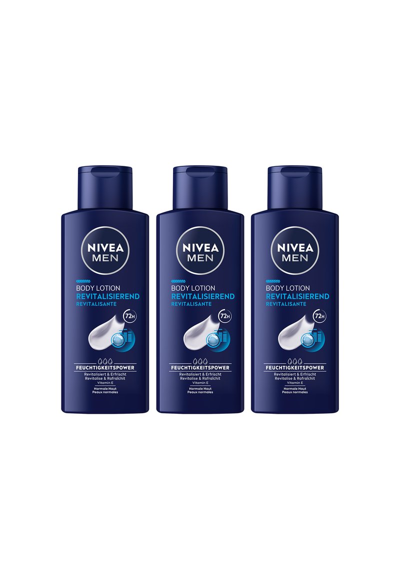 Three navy blue NIVEA Men body lotion bottles labeled "Revitalizing" with 72-hour hydration and Vitamin E for normal skin.