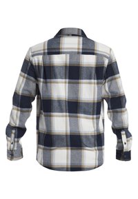 Långärmad flanellskjorta med ett rutmönster i marinblått, vitt och beige. Inkluderar en knappslutning vid ärmen och en rak fåll med detaljer på ryggpartiet.