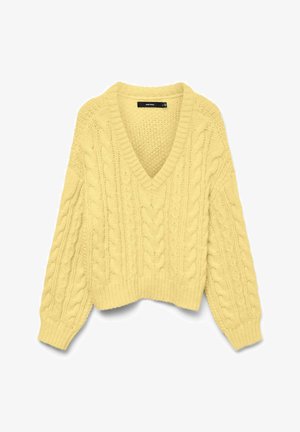 Kollane paksust lõngast V-kaelusega kampsun, millel on palmiku muster ning soonikud varrukaotstel ja allääres, sirgelt valgel taustal.