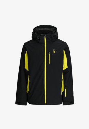 Zwarte en neongele waterdichte jas met capuchon, voorzien van twee zijzakken met ritssluiting en een borstzak met rits, en een spinnenlogo op de borst.