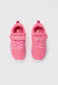 Pink mesh sneakers with a Velcro strap and laces, featuring a white sole and light pink accents. Smooth texture and breathable design.