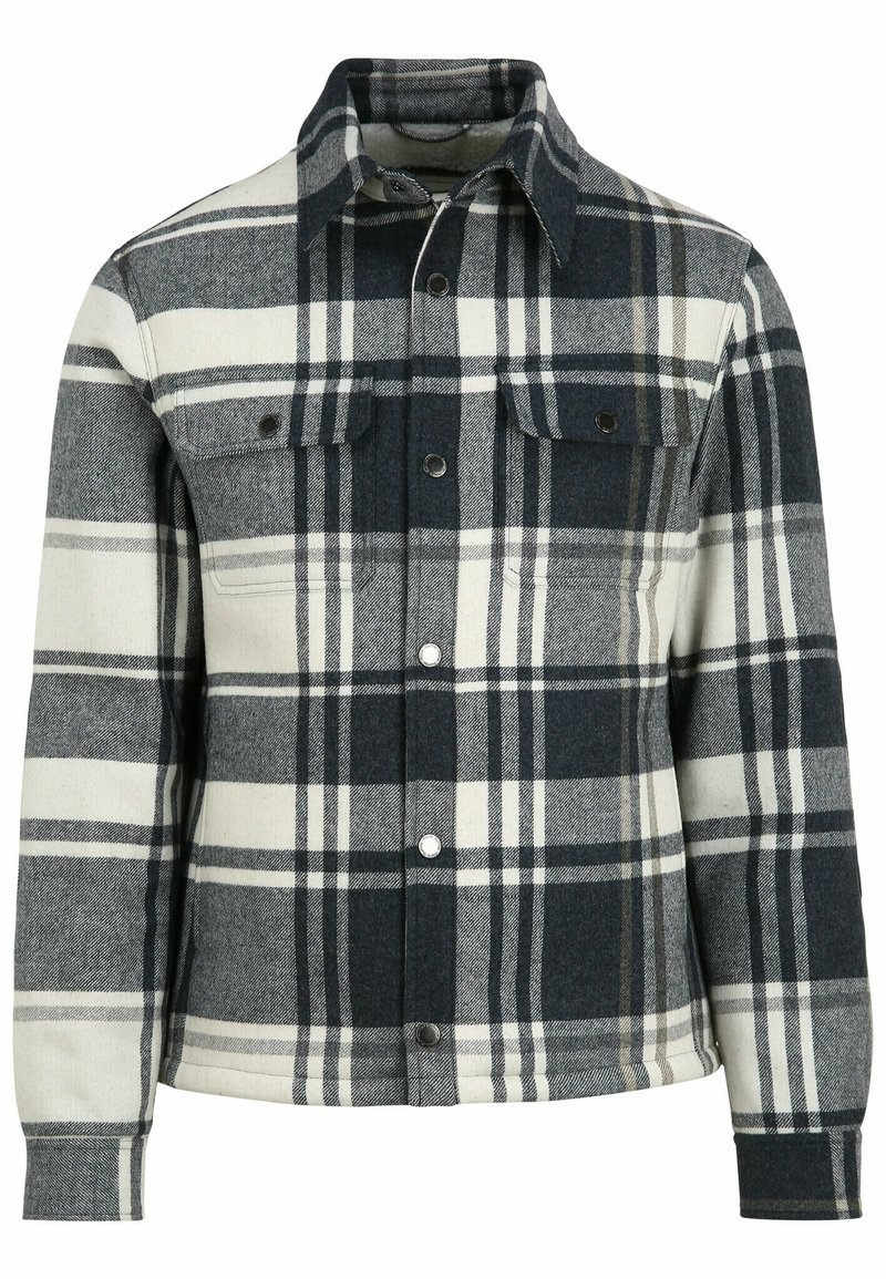 Veste à carreaux noire, blanche et grise à boutons, avec deux poches poitrine et manches longues, style col classique.