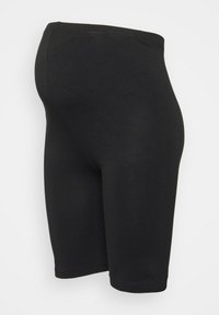Leggings noirs avec une texture lisse, de longueur mi-cuisse, avec une taille élastique et sans motifs ni détails métalliques visibles.