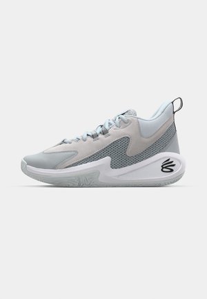 Light gray athletic shoes with a mesh and suede upper, featuring a white sole and black accent on the heel. Curved design elements visible.