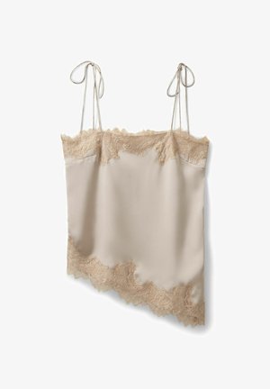 Beežist satiinist kamisol pitsist äärega üleval ja asümmeetrilise äärega, millel on õhukesed reguleeritavad õlapaelad, mis on seotud vibu kujul.