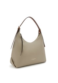 Beige leather shoulder bag with a smooth texture, rounded shape, brown leather strap, and zipper detail. Features brand logo printed on the front.