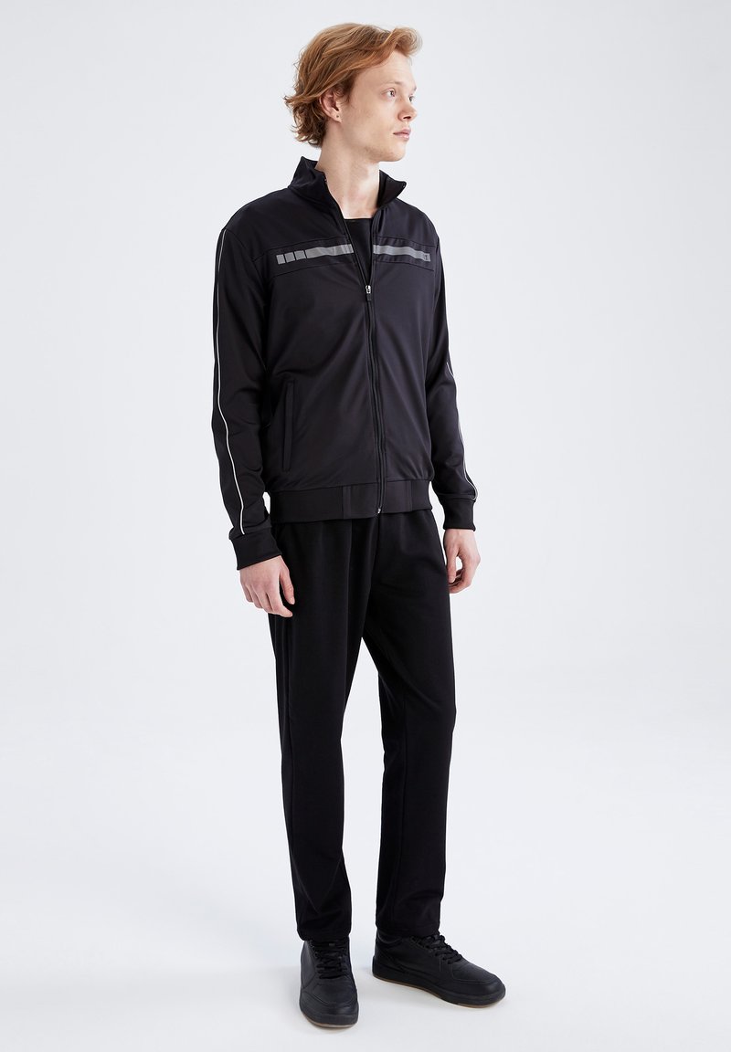 Herren Trainingsanzüge | DeFacto SLIM FIT Trainingsjacke black/schwarz - ZZ61071 Herren Trainingsanzüge | DeFacto SLIM FIT Trainingsjacke black/schwarz - ZZ61071