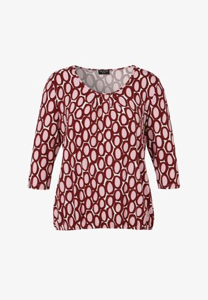 Rote und rosa Tunika mit einem Muster aus ovalen Formen, mit Rundhalsausschnitt und 3/4-Ärmeln; am Saum leicht gerafft.