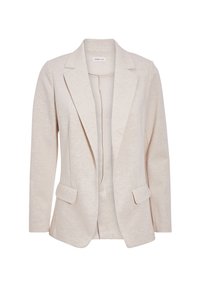 Blazer beige en tissu doux avec une légère texture. Dispose d'un col cranté, de deux poches avant et d'une coupe ouverte sur le devant.