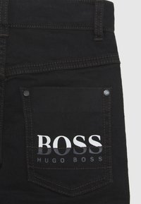 BOSS Kidswear TROUSERS - Calças de ganga justas - black
