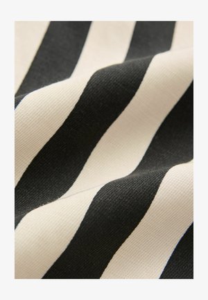 Bomuldsstof med vekslende tykke sorte og beige striber, med en glat tekstur og en let glans.