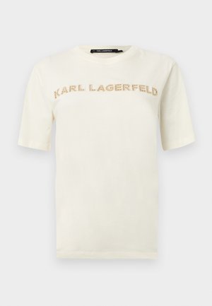 Λευκό κοντομάνικο μπλουζάκι με το κείμενο "KARL LAGERFELD" σε μπεζ γραμματοσειρά με σχέδιο στο στήθος.