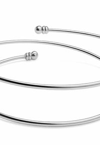 Bracciale rigido aperto in argento con estremità arrotondate a forma di pallina e due piccoli anelli decorativi vicino a ciascuna estremità.