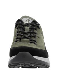 Lightweight sneaker featuring a green suede and black fabric upper, round laces, rubber sole, and textured tread for grip.