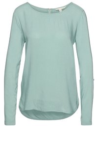 Ljus mintgrön långärmad skjorta med rund halsringning, slät textur och dragkedjedetalj på baksidan. Rundad fåll vid midjan.