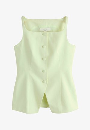 Bezroku gaiši dzeltena lina veste ar kvadrātveida kakla izgriezumu, pieciem ar audumu pārklātiem pogām centrā un priekšu šķēlumu apakšmalā.