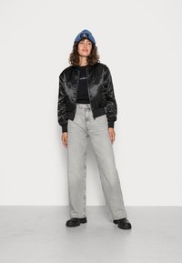 Calvin Klein Jeans REVERSIBLE - Blusão aviador - black