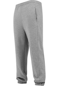 Graue Jogginghosen aus weichem Stoff, mit elastischen Bündchen und seitlichen Taschen, in entspannter Passform und schlichtem Design.
