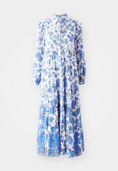 Kergelt sinise ja valge õieprindiga maksikleit. Omab nööpidega esiosa, pikki puffvarukaid ja tasapinnalist äärt erinevate mustritega.