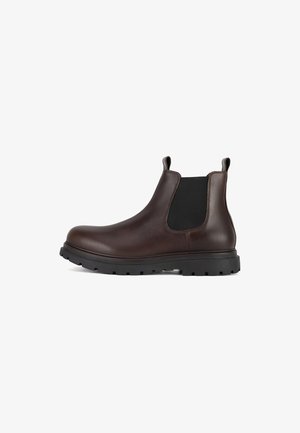 Brauner Chelsea-Stiefel aus Leder mit schwarzen elastischen Seitenteilen, Zuglaschen und einer dicken schwarzen Gummiprofilsohle.