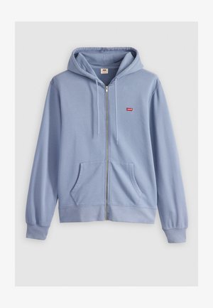 Felpa zipata azzurro chiaro realizzata in morbido cotone, con tasca a marsupio e piccolo logo rosso di Levi's sul lato sinistro del petto.