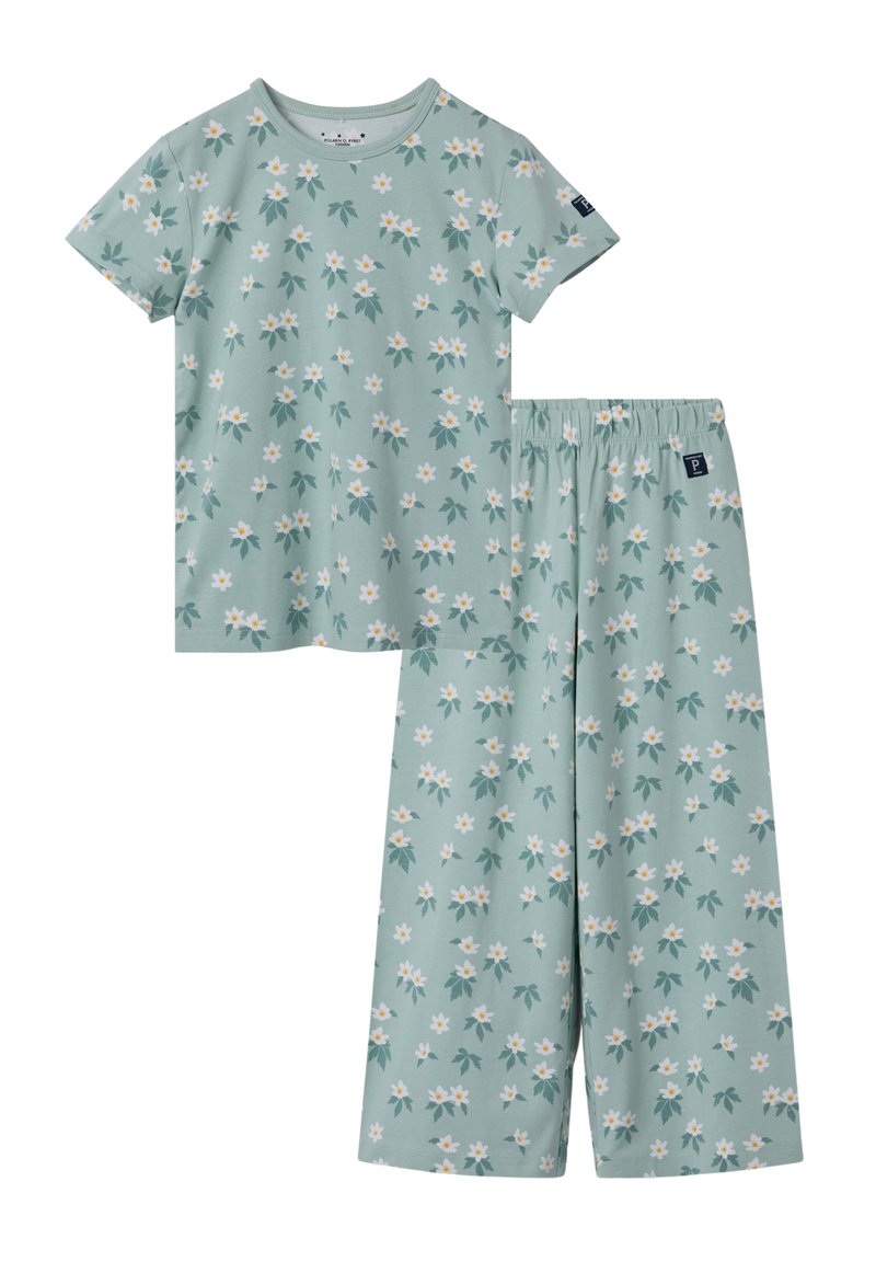Lichtgroene set met een top met korte mouwen en een broek met wijde pijpen. Beide hebben een bloemenpatroon in wit en donkergroen, gemaakt van zachte stof.