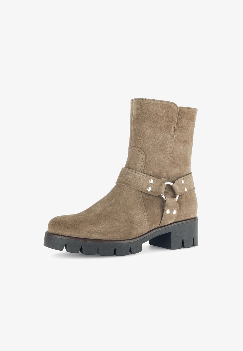 Suede ankle boot in taupe, featuring a wide strap with a metal ring accent, notched sole, and block heel for added stability.