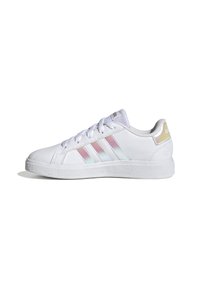 White sneaker with iridescent three stripes and heel accent, smooth synthetic upper, rubber sole, and round toe design.