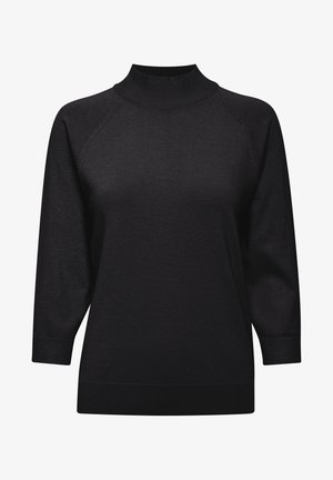Fekete kötött pulóver magas gallérral, háromnegyedes raglánujjakkal, bordázott mandzsettákkal és szegéllyel. Simaság jellemzi egyszínű tónusával.