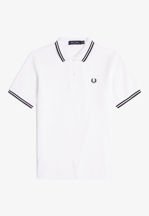 Witte polo met korte mouwen, met zwarte dubbele strepen op de kraag en manchetten, een knoopsluiting en een klein zwart geborduurd logo op de borst.