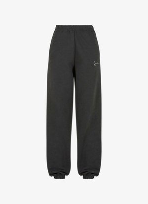 Dunkelgraue Jogginghose mit elastischem Bund, umgekrempelten Knöcheln und dezentem Logo-Detail auf der linken Seite. Aus weichem Stoff gefertigt.