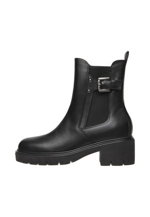 Black leather ankle boot with elastic side panels, a chunky heel, silver buckle detail, and textured sole for improved grip.