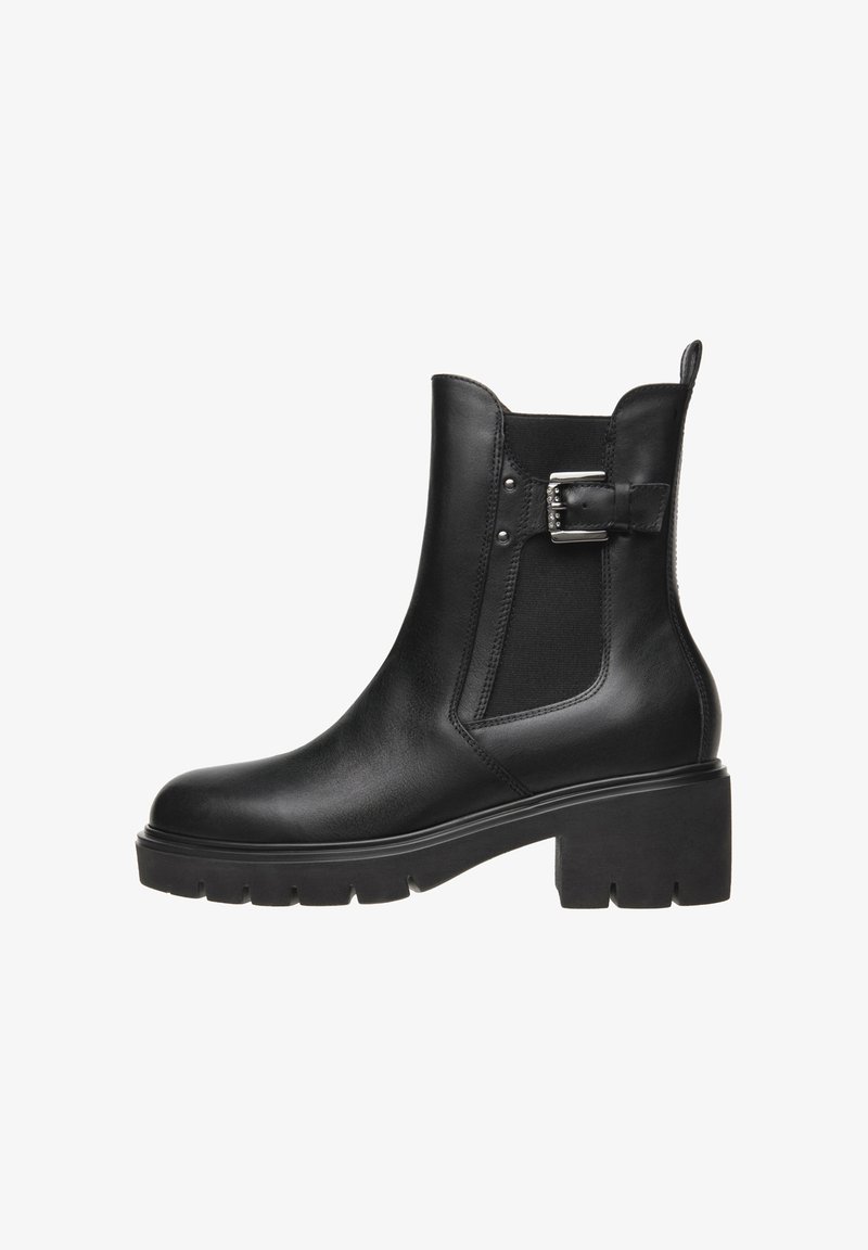 Black leather ankle boot with elastic side panels, a chunky heel, silver buckle detail, and textured sole for improved grip.