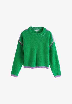 Zöld, bolyhos pulóver lila szegéllyel az ujjvégeken, szegélyen és vállakon, a nyakrésznél pedig hímzett "Good Vibes" felirattal.