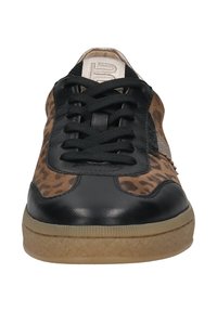 Low-top sneaker with black leather, leopard print sides, black laces, beige tongue, and textured light brown rubber sole, front view.
