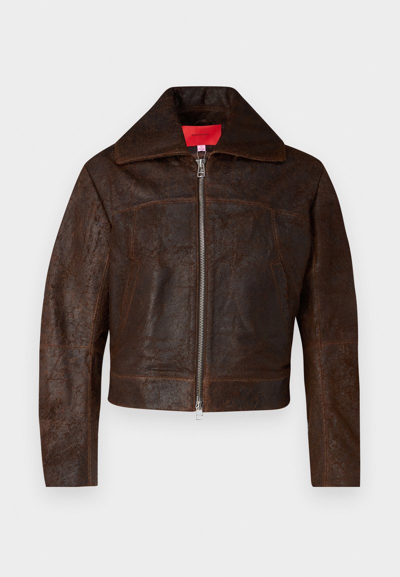 Brown leather jacket featuring a zip closure, wide collar, front pockets, and a cropped silhouette with visible texture details.