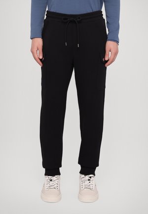 FASHION JOGGER - Tracksuit bottoms - black