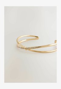 Geselecteerd, gold tone