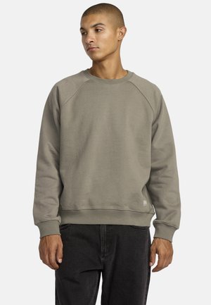 Olijfgroen katoenen sweatshirt met ronde hals, raglanmouwen, ribgebreide manchetten en zoom, met een klein merklogo aan de onderkant.