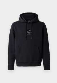 Schwarzer Hoodie aus weich gemischter Baumwolle, verfügt über eine Fronttasche, eine Kapuze mit Kordelzug und ein kleines Logo auf der Brust. Einfaches, lässiges Design.