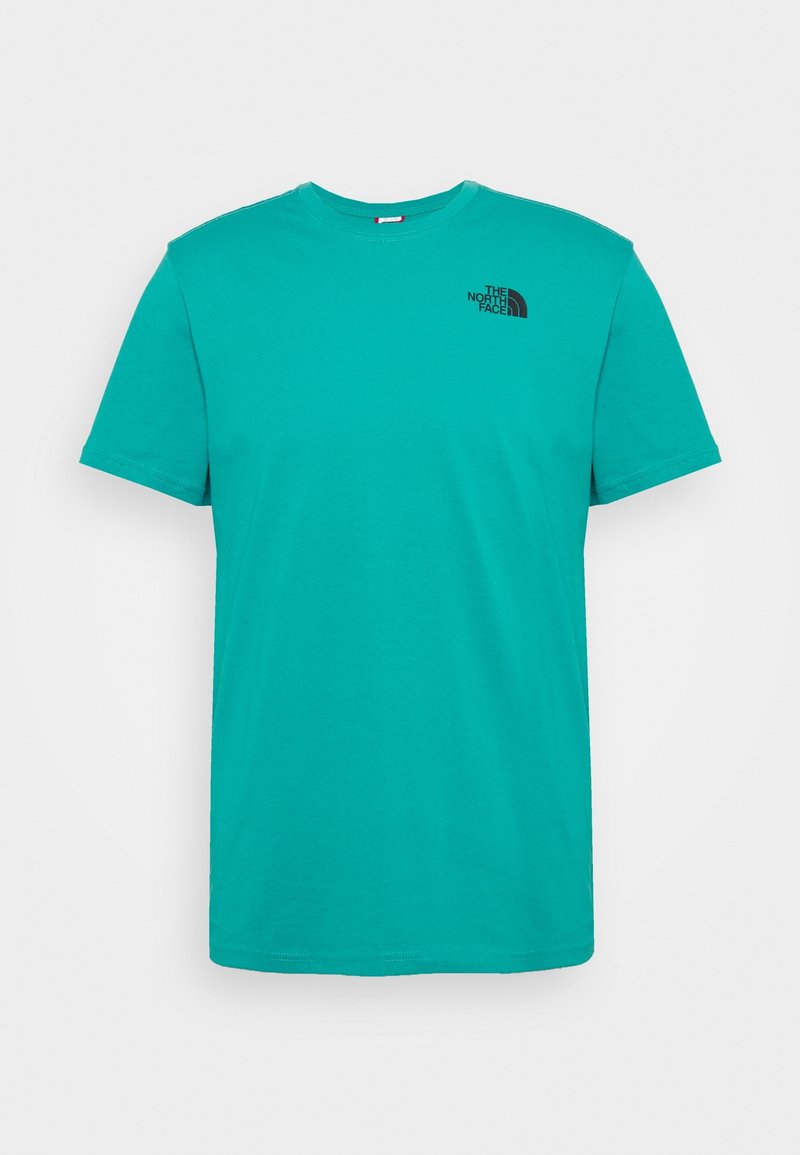 Camiseta turquesa de manga corta hecha de algodón con cuello redondo. Presenta un logo negro en el área del pecho izquierdo. Diseño sencillo, sin patrones.