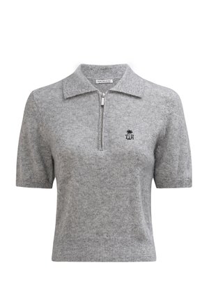 Light grey short-sleeve knit top with collar, front zipper, ribbed hem, and small black palm tree and "TJR" logo on left chest.