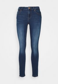 Smala jeans i mörkblå denim med hög midja, fem fickor och dragkedja vid fållen. Slät textur med lätt blekning.