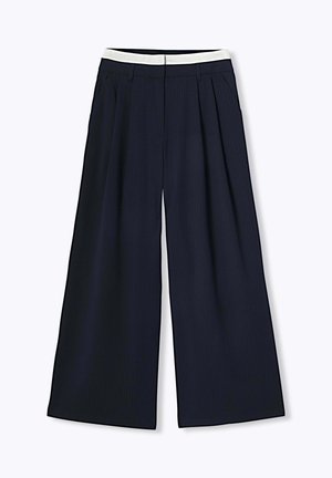 PANTALON TRÈS LARGE RAYÉ - Pantalon classique - rayé marine