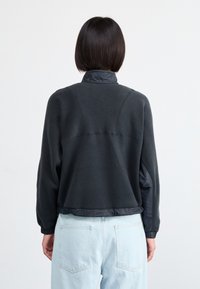 Salomon OUTLINE NOV CROP - Felpa in pile - deep black